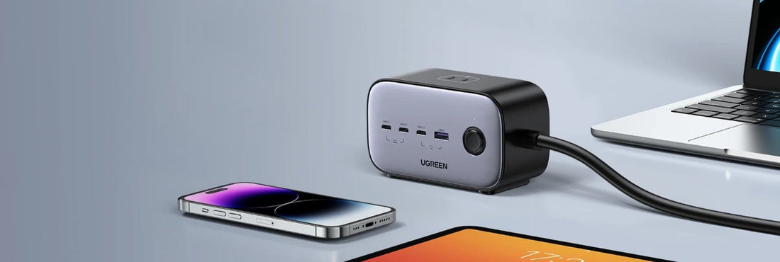 UGREEN desktop USB-C charger powering a laptop and smartphone on a clean workspace
