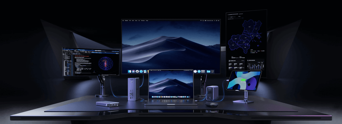 Multi-monitor workstation connected through UGREEN docking stations and USB accessories