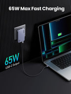 altUGREEN  Nexode Pro 65w ultra iphone charger It is plugged into a wall socket and connected to a laptop via a USB-C cable, highlighting the 65W USB-C output."