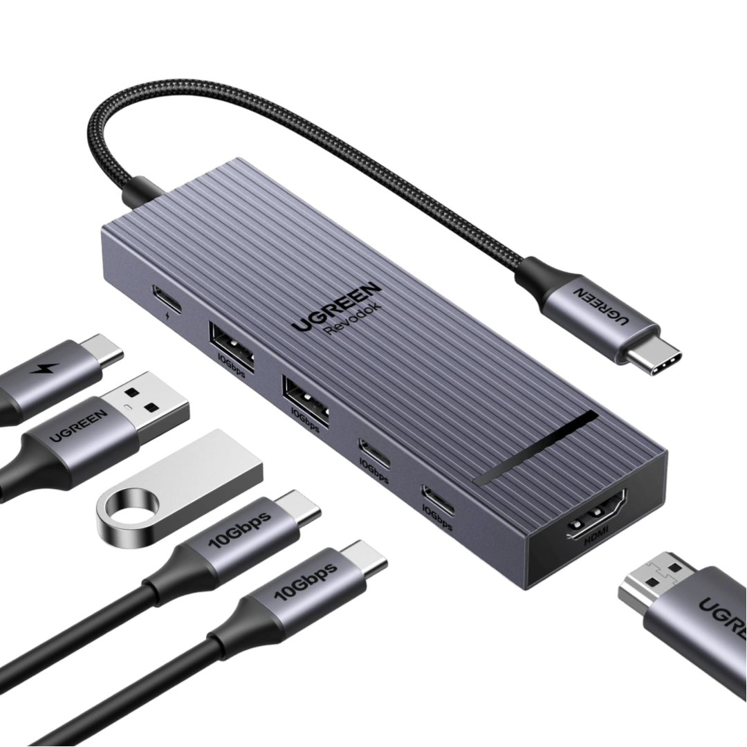 Hub USB-C conectado a notebook com periféricos em mesa de trabalho