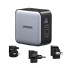 UGREEN 65W iphone charger with a sleek gray and black design, featuring a USB-A port and two USB-C ports (USB-C1 and USB-C2). Accompanied by three different types of plug adapters for international use.