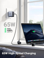 UGREEN 65W iphone charger with  high-speed charging capability. It the charger plugged into a wall socket, charging a MacBook Air (M2) to 100% in 90 minutes. The charger has multiple ports and is accompanied by two plug adapters on the windowsill.